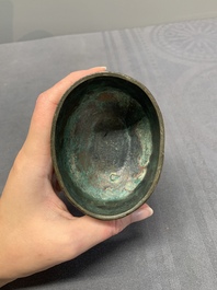A Chinese archaistic bronze 'Taotie' wine vessel and cover, 'you 卣', Ming