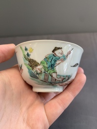A pair of Chinese famille rose 'beloved by the river' cups and saucers, Yongzheng