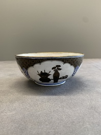 A pair of Chinese Canton enamel 'antiquities' bowls, Yongzheng/Qianlong