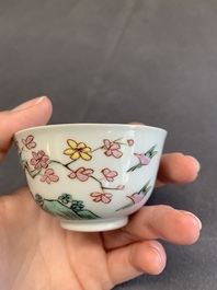 A pair of Chinese famille rose 'beloved by the river' cups and saucers, Yongzheng
