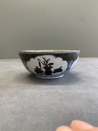 A pair of Chinese Canton enamel 'antiquities' bowls, Yongzheng/Qianlong