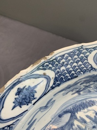 A Chinese Swatow blue and white dish with deer in a landscape, Ming