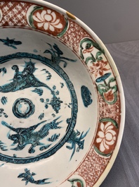 RETURNED 10/12/24 Two Chinese Swatow red-, turquoise- and black-enamelled 'phoenixes' and 'river landscape' dishes, Ming
