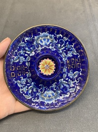 A pair of Chinese Canton enamel 'double happiness 囍' trembleuse cups and saucers, Qianlong/Jiaqing