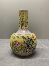 A Chinese famille rose yellow-ground bottle vase, Bao Shan Zhai 寶善斎 mark, 19th C.