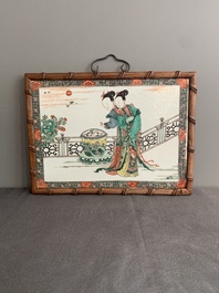 A Chinese famille verte plaque with ladies in a garden, Kangxi
