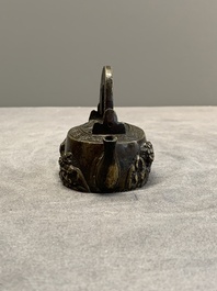 A Japanese bronze 'shishi lions' water dropper, Meiji, 19th C.