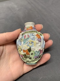 A Chinese molded famille rose 'playing boys' snuff bottle, Qianlong mark, 19th C.