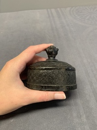 A Chinese archaistic bronze 'Taotie' wine vessel and cover, 'you 卣', Ming