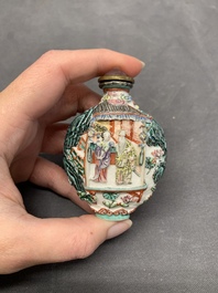 A Chinese famille rose relief-molded snuff bottle with an animated river landscape, Jiaqing mark and of the period
