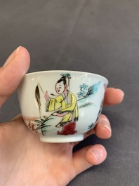 A pair of Chinese famille rose 'beloved by the river' cups and saucers, Yongzheng