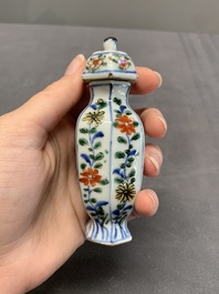 A rare Chinese famille verte garniture of five miniature vases with floral design, Kangxi
