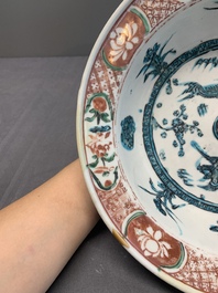 RETURNED 10/12/24 Two Chinese Swatow red-, turquoise- and black-enamelled 'phoenixes' and 'river landscape' dishes, Ming