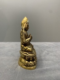 A Sino-Tibetan gilt bronze figure of a lama, 18/19th C.