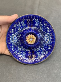A pair of Chinese Canton enamel 'double happiness 囍' trembleuse cups and saucers, Qianlong/Jiaqing