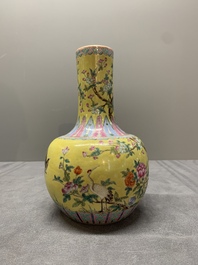 A Chinese famille rose yellow-ground bottle vase, Bao Shan Zhai 寶善斎 mark, 19th C.