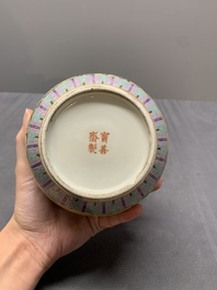 A Chinese famille rose yellow-ground bottle vase, Bao Shan Zhai 寶善斎 mark, 19th C.