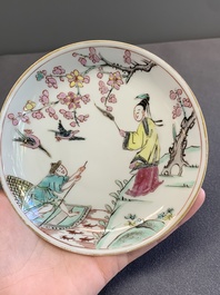 A pair of Chinese famille rose 'beloved by the river' cups and saucers, Yongzheng
