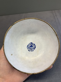 A pair of Chinese Canton enamel 'antiquities' bowls, Yongzheng/Qianlong