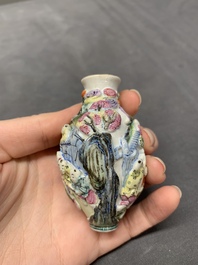 A Chinese molded famille rose 'playing boys' snuff bottle, Qianlong mark, 19th C.