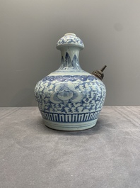 An unusual Chinese blue and white kendi, inscribed Tjienbielcie Tjantjekeng Surabaya, 19th C.