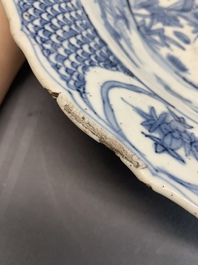 A Chinese Swatow blue and white dish with deer in a landscape, Ming