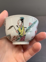 A pair of Chinese famille rose 'beloved by the river' cups and saucers, Yongzheng