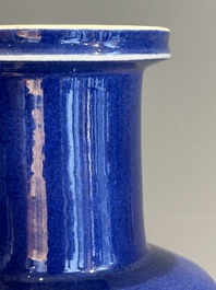 A Chinese monochrome powder blue rouleau vase, 19th C.
