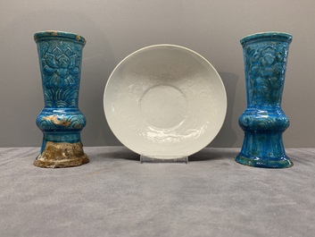 A Chinese incised white-glazed bowl and a pair of turquoise-glazed vases, Ming