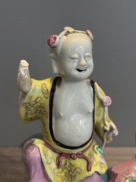 A Chinese famille rose group of Hehe Erxian on wooden stand, Qianlong
