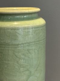 A Chinese Longquan celadon cylindrical vase with incised floral design, Ming