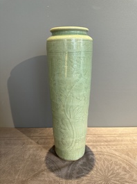 A Chinese Longquan celadon cylindrical vase with incised floral design, Ming