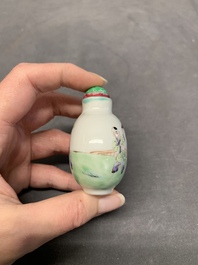 Four Chinese famille rose, verte and blue and white snuff bottles, Qianlong mark, 19/20th C.