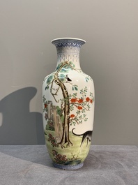 A Chinese famille rose vase, Qianlong and Shinian 世寧 mark, 20th C., and a qianjiang cai vase, signed Ren Huanzhang 任煥章, dated 1942