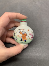 Four Chinese famille rose, verte and blue and white snuff bottles, Qianlong mark, 19/20th C.