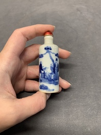 Four Chinese famille rose, verte and blue and white snuff bottles, Qianlong mark, 19/20th C.