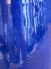 A Chinese monochrome powder blue rouleau vase, 19th C.