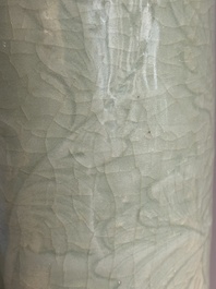 A Chinese Longquan celadon cylindrical vase with incised floral design, Ming