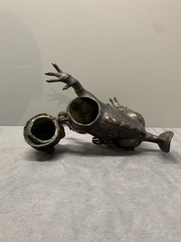 A rare Chinese bronze lion-form incense burner and cover, Song/Ming