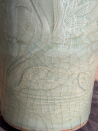 A Chinese Longquan celadon cylindrical vase with incised floral design, Ming