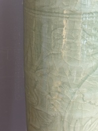 A Chinese Longquan celadon cylindrical vase with incised floral design, Ming