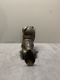 A rare Chinese bronze lion-form incense burner and cover, Song/Ming
