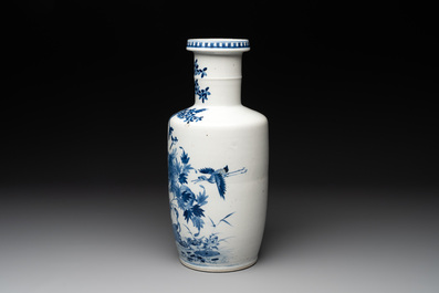 A Chinese blue and white vase with birds among flowering branches, 19th C.