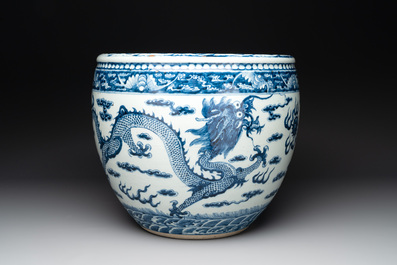 A Chinese blue and white 'dragon' fish bowl, 19th C.