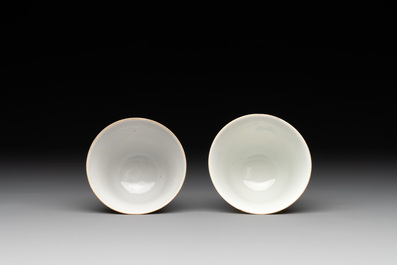 A pair of Chinese famille rose 'monkey and deer' cups and saucers, Tongzhi mark and of the period