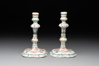 A pair of rare Chinese export famille rose candlesticks with floral design, Yongzheng/Qianlong