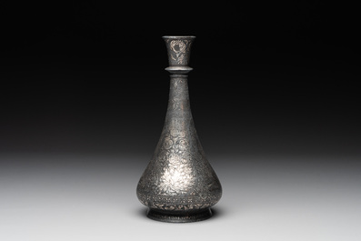 A bidriware vase, a steel hookah cup and three copper alloy hookah mounts, India/Persia, 19th C.