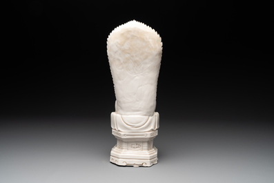 A Chinese Dehua blanc de Chine seated Guanyin, Qianlong mark, Republic
