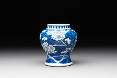 A pair of Chinese blue and white 'gu' vases, three jars, a plate and a plaque, Kangxi mark, 19th C.