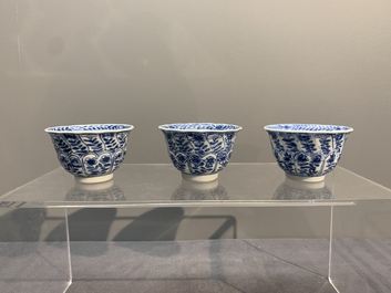 Six Chinese blue and white cups and saucers with floral design, Kangxi
